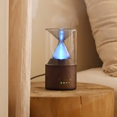 Nebulizing diffuser designed by Green-Life for pure essential oil diffusion in premium aromatherapy product collections