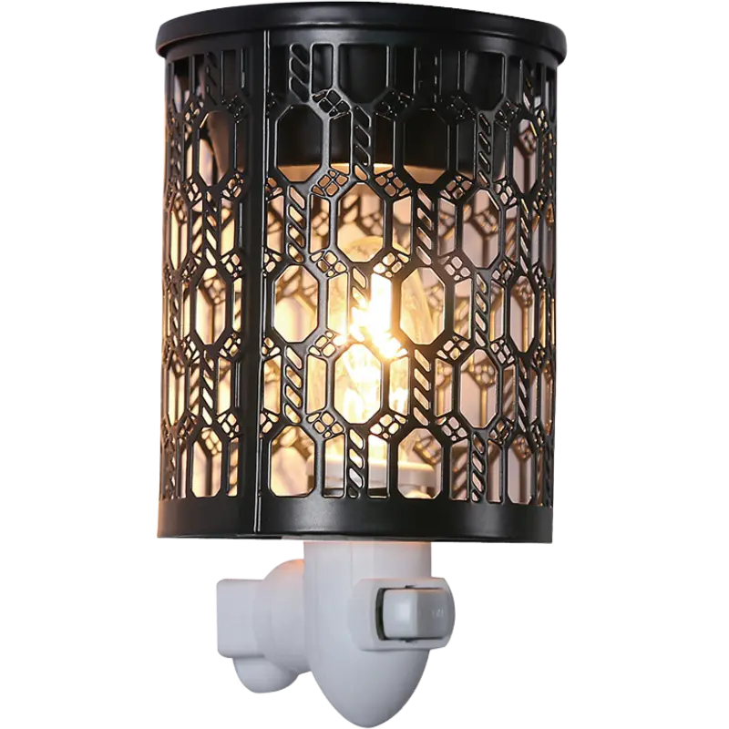Green-Life metal plug-in wax warmer GF24EP1181E14 with cutout pattern, creating ambient light projection while melting wax for decorative fragrance collections.
