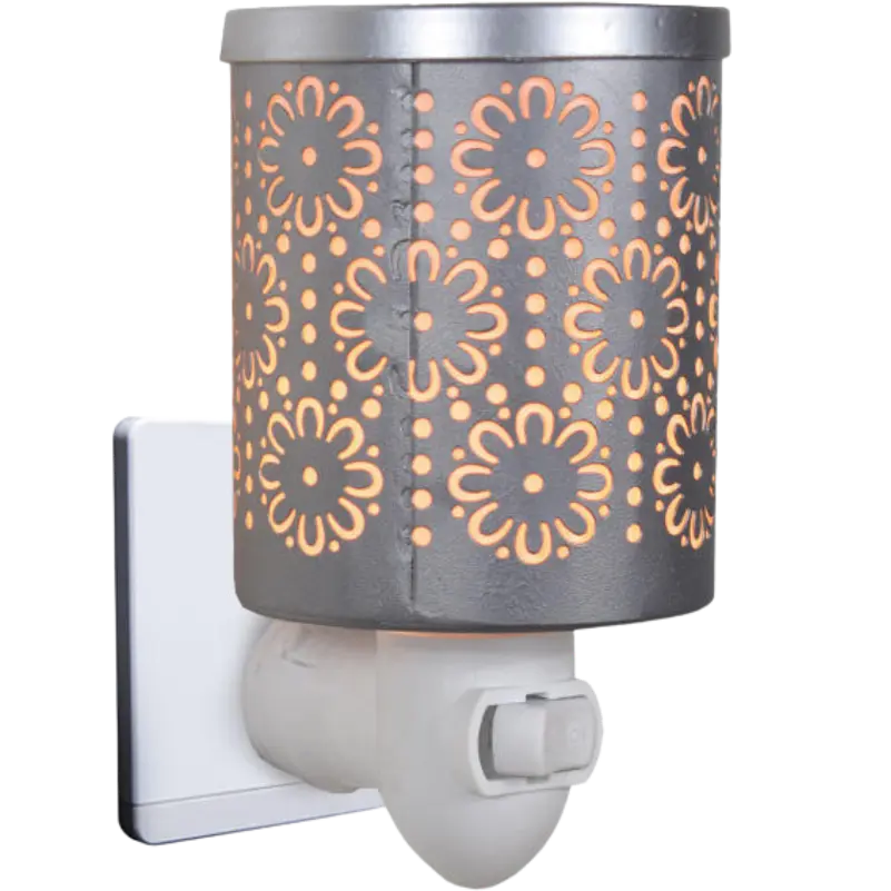 Green-Life metal plug-in wax warmer GF24EP1412E13 with cutout pattern, creating ambient light projection while melting wax for decorative fragrance collections.