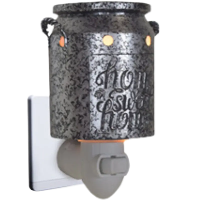 Green-Life metal plug-in wax warmer GF24EP1429E13 with cutout pattern, creating ambient light projection while melting wax for decorative fragrance collections.