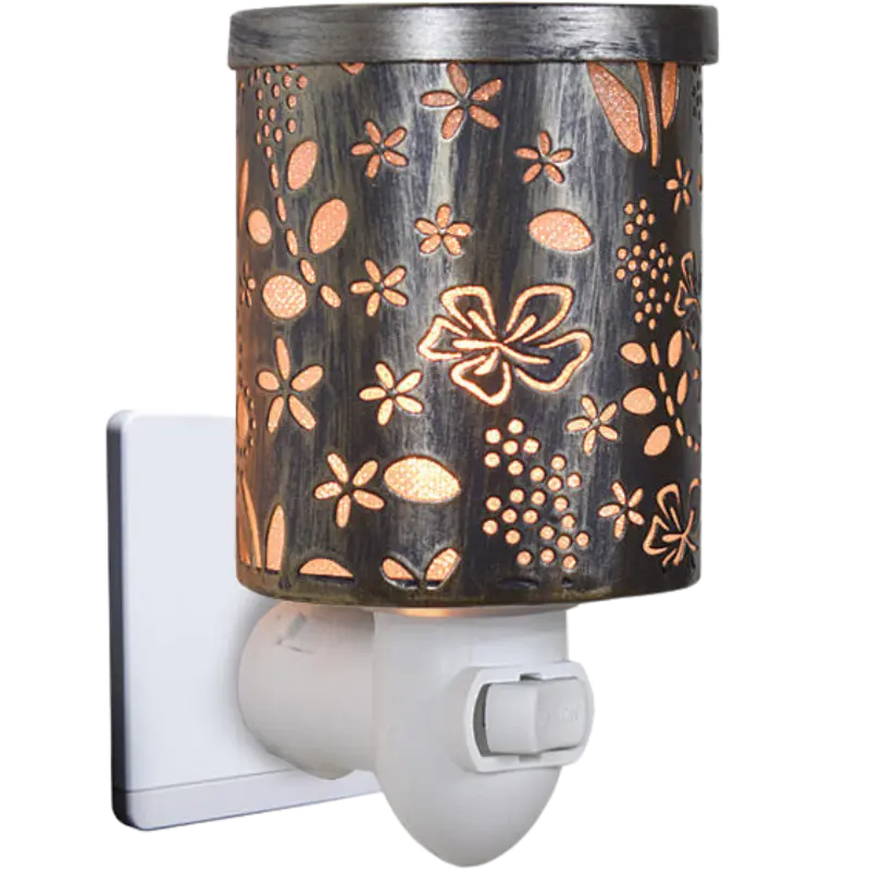 Green-Life metal plug-in wax warmer GF24EP1432E13 with cutout pattern, creating ambient light projection while melting wax for decorative fragrance collections.