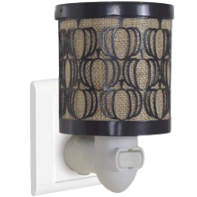 Green-Life metal plug-in wax warmer GF24EP1439E13 with cutout pattern, creating ambient light projection while melting wax for decorative fragrance collections.
