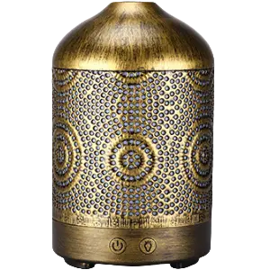 Green-Life metal ultrasonic diffuser GF24EA286E22 with traditional decorative cutout patterns, blending classic metal craftsmanship with ultrasonic aroma diffusion for decorative fragrance product lines.