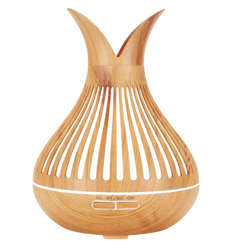 Green-Life plastic ultrasonic diffuser GF24EA211E22 with cutout pattern design, projecting decorative light patterns while diffusing essential oils.