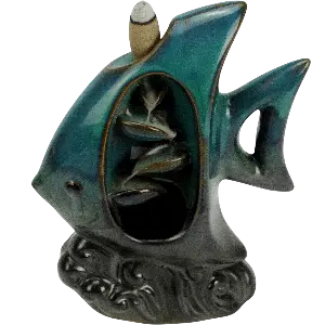 Green-Life ceramic backflow incense burner GL24IB668C with animal design, creating flowing smoke effect for fragrance brands developing visually differentiated decorative product lines