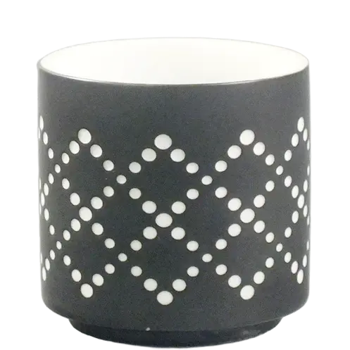 Green-Life ceramic luminary candle holder GLC180570 with cutout pattern, projecting decorative light effects that support seasonal launches and visual merchandising.
